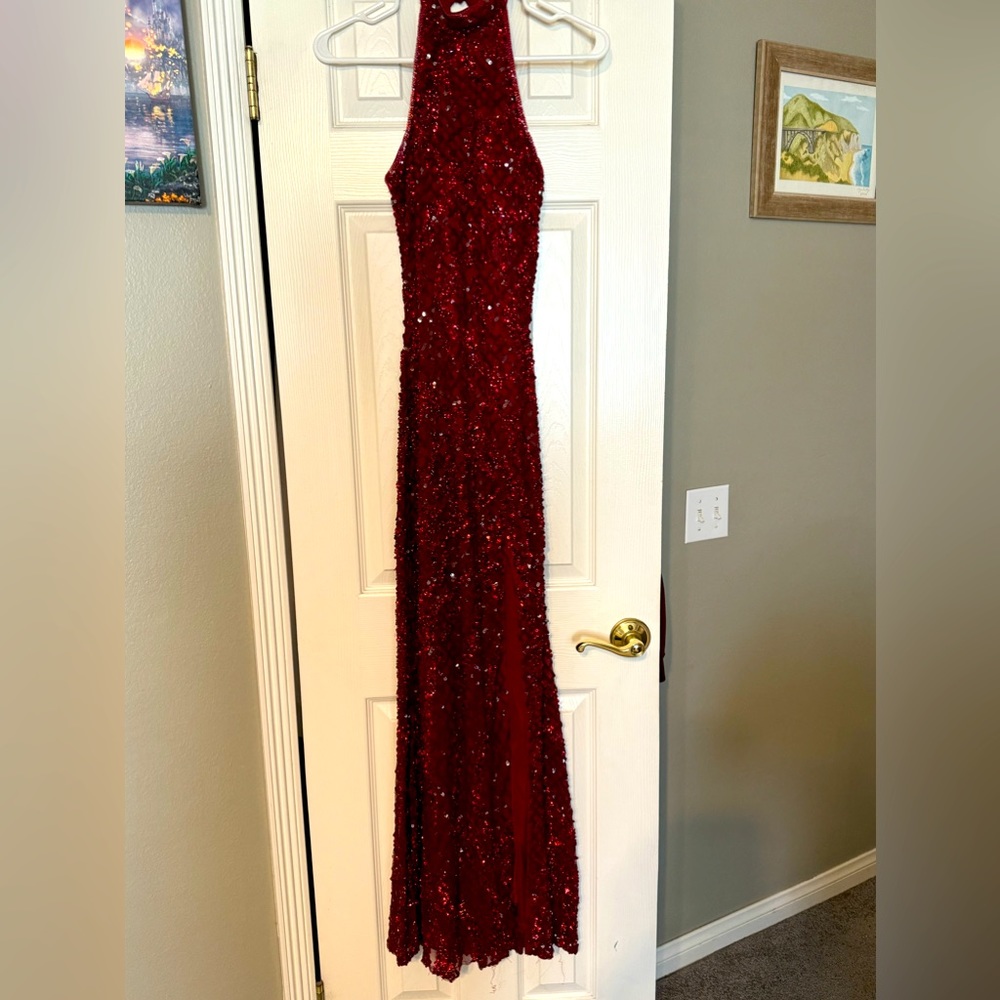 Beautiful ruby red formal halter style dress. Size: 6